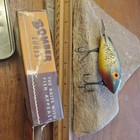 Nib Vtg Wood Bomber  670 Fishing Lure Silver Bk Sprkle Yellow Belly Heddon Storm