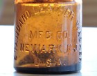 Standard Leather Washer Mfc  Co  Newark  N j   Amber Mold Blown Blob Top Bottle