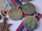 Mixed Collection Of British Wwii War Medals  Cap Badges   Soviet Pins 