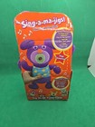 Sing A Ma Jigs Purple Singing Doll  2010 Needs New Batteries