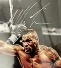 Mike Tyson Autograph Signed Photo Punching Evander Holyfield  jsa Cert  8x10
