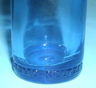 Two Antique Cobalt Blue Embossed Medicine Bottles  bromo Seltzer Bromo Caffeine 