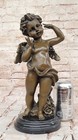 French Antique Reproduction Bronze  Sculpture statue Of A Cherub  Girl By A Mor