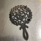 Vintage Cast Iron Footed Trivet Amish Man 6     Wall Decor