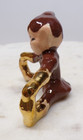 1950s Gilner Elf Pixie Sitting Touching Toes Figurine Brown With Gold Trim