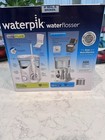 Waterpik Ultra Plus   Nano Water Flosser Combo  12 Tips  Storage travel Case