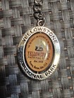 Vintage Yellowstone National Park Metal Keychain Rotating Center Souvenir Nos