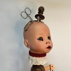 Creepy Doll With Scissors And Key