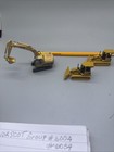 1 87 Scale Lot Of  3  Heavy Equipment  2  Cat Bulldozers And  1  Cat Escalator D