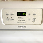 Gas Tappan White Stove Measures 30x25x35 With 4 Burners   2 Oven Racks   Clock