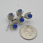 Floral Rhinestone Brooch Royal Blue Silver Tone Filigree Bouquet Prong Lapel Pin
