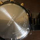 Seiko Men s Quartz Chronograph Date 100m Black gold Dial Metal Bracelet
