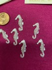 Vintage Plastic White Pearl Seahorses - Flat Back - 18 Pieces