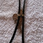 Vintage Bolo Tie Featuring A Silver-tone  native American Chief Shield Dance    