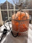 Mesmerizing Himalayan Salt Lamp In Delightful White Metal  bird Cage  Container
