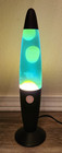 13 5  Lava  Yellow Wax In Green Liquid  Black Metal Base- Free Shipping