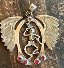 Rare Grateful Dead Sterling Silver Winged Skeleton Pendant Red Gemstones  925   