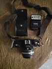 Vintage Nikon Em 35mm Film Slr Camera With 50mm Lens flash strap  And Case