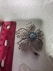 Silver Tone Filigree Flower Brooch Pin  Blue Round Simulated Rhinestones