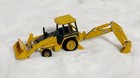 Ertl Toys  John Deere Yellow And Black Tractor Backhoe Loader Die Cast Vehicle
