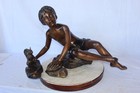 Adventurous Boy With Squirrel Bronze Statue -  Size  36 l X 18 w X 22 h 